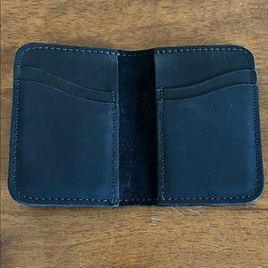 Sleek Black Leather Card Holder
Used only a few times